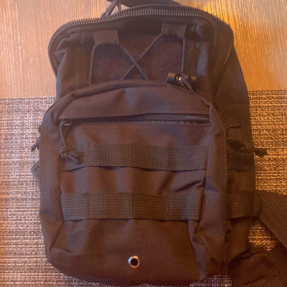 Unisex, black multi-purpose sling durable bag